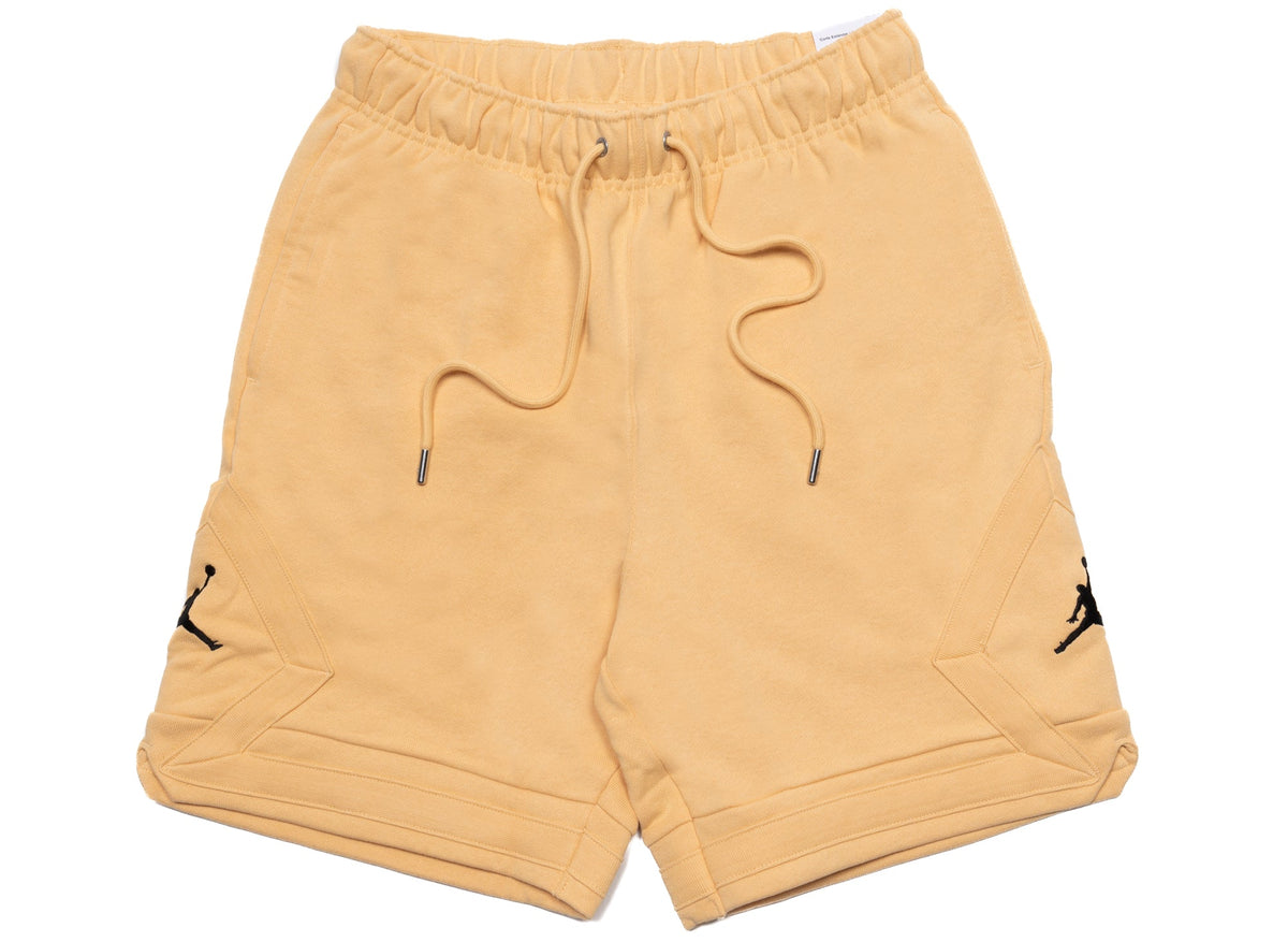 Jordan Flight Fleece Essentials Shorts in Celestial Gold / Black